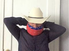 Bandana Gagged and Pigtied Cowboy